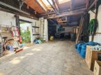 Einfamilienhaus in einem Gartenparadies mit eigenem Bachlauf - Garage