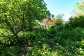 Einfamilienhaus in einem Gartenparadies mit eigenem Bachlauf - Gartenansicht